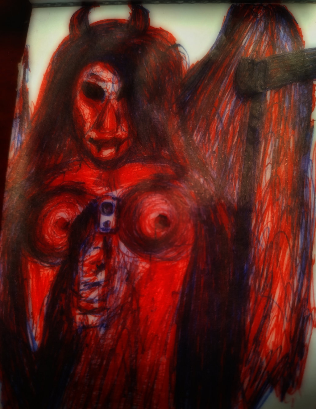 A closer shot (pun intended), showing just the figure's drawing from the previous photo (check its alt-text for more info). It's possible to see the pen sketches.